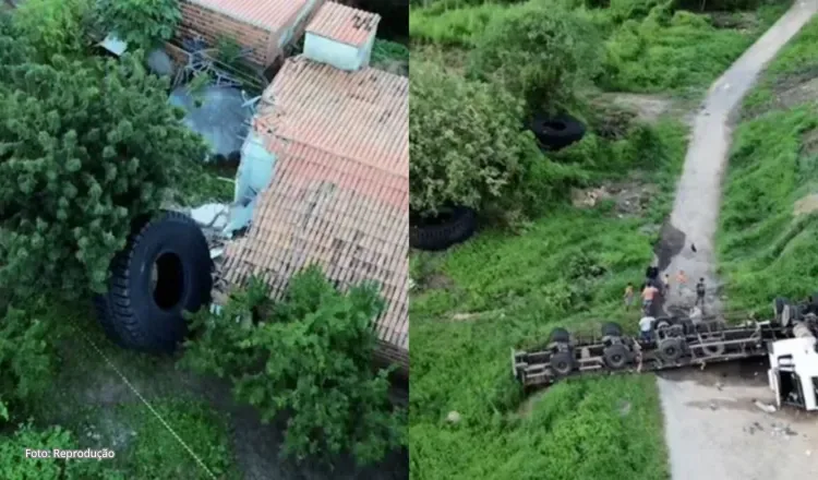 Carreta tomba na BR-222 em Itapajé e pneus gigantes atingem casas; mulher e bebê ficam feridos